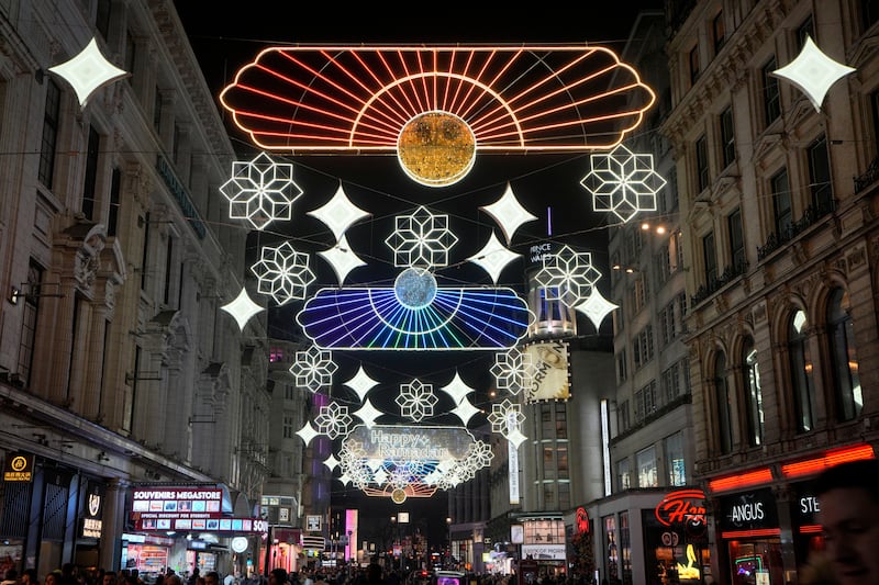 Ramadan lights are lit to celebrate the coming start of the holy month at Piccadilly Circus, London, on March 7. AP