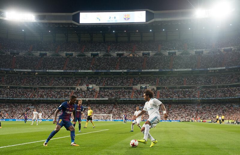 MADRID, SPAIN - AUGUST 16: Marcelo of Real Madrid takes on Nelson Semedo of FC Barcelona during the Supercopa de Espana Final 2nd Leg match between Real Madrid and FC Barcelona at Estadio Santiago Bernabeu on August 16, 2017 in Madrid, Spain. (Photo by Denis Doyle/Getty Images)