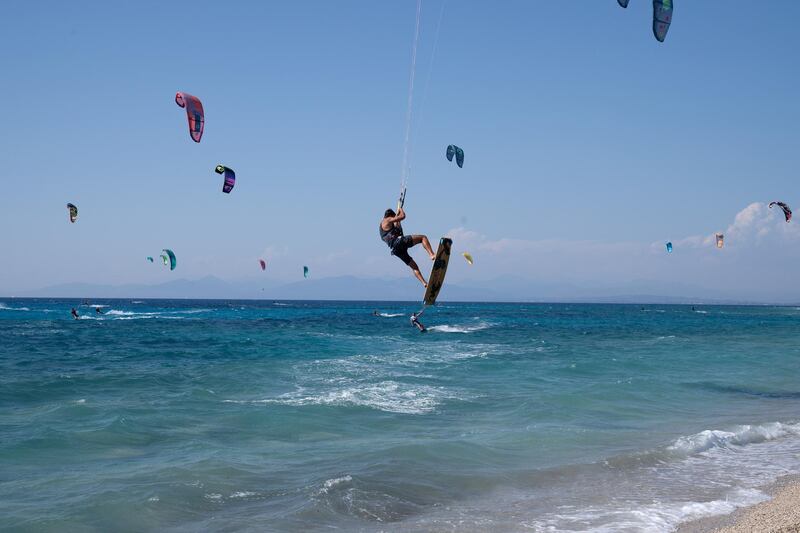 Kite surfers at Mylos beach on the Greek island of Lefkadano on Saturday, July 25. Reuters