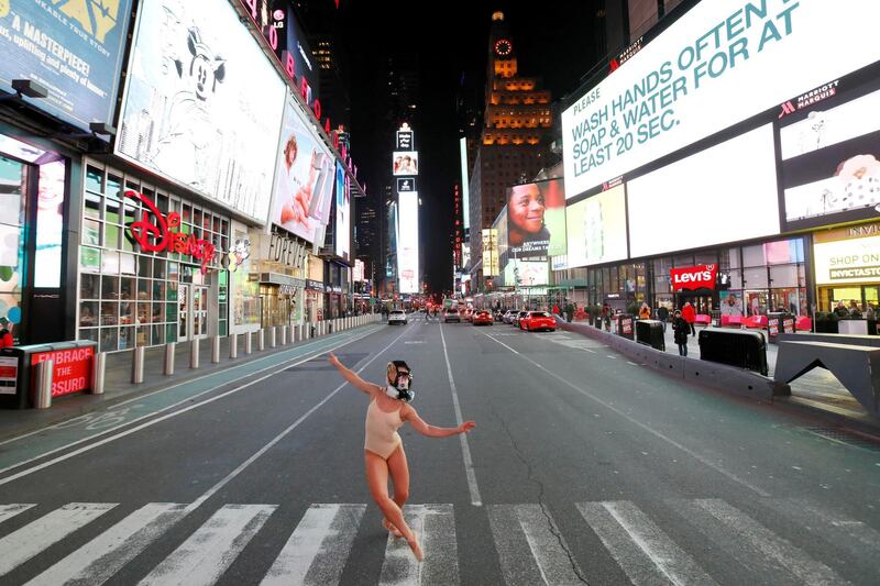 Ballet dancer and performer Ashlee Montague of New York wears a gas mask while she dances in Times Square in Manhattan, New York City. Reuters