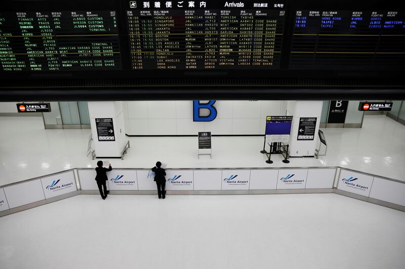 Narita International Airport in Japan is quiet after travel was restricted to prevent the spread of Omicron. Reuters