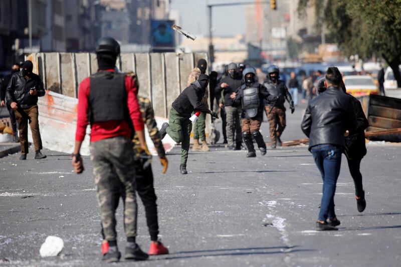 Iraqi demonstrators clash with security forces during the ongoing anti-government protests in Baghdad. REUTERS