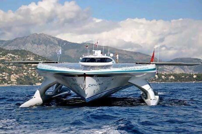 The Turanor PlanetSolar in May became the first boat to circumnavigate the globe using only the power of sunlight. Dominic Favre / EPA