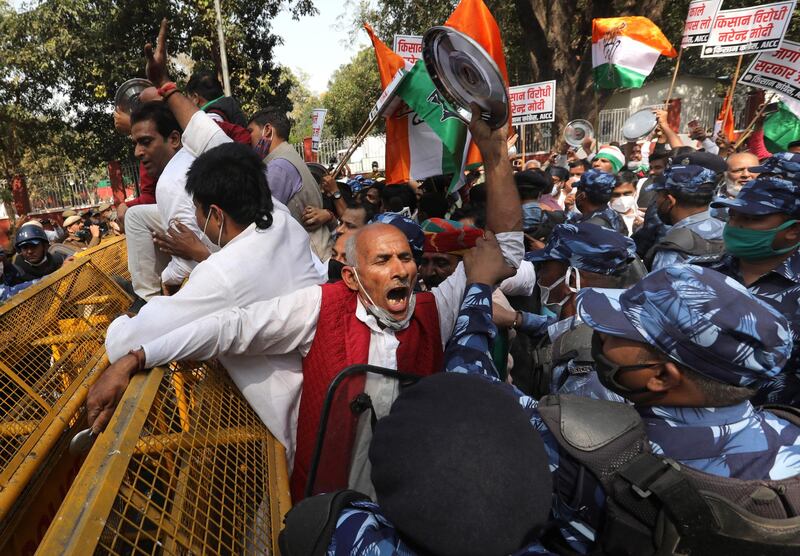 Indian National Congress activists clash with police during a demonstration in solidarity with protests by India's farmers against new agricultural laws, in New Delhi, India. EPA