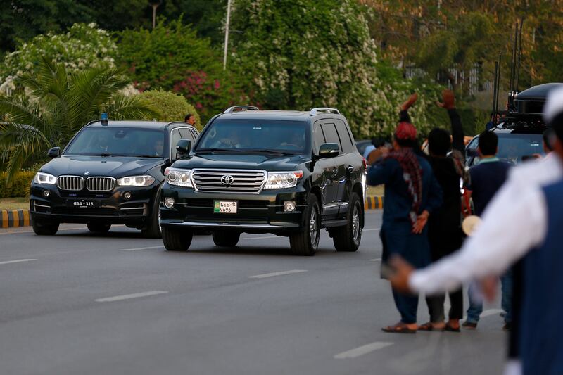 Supporters line the street as Shahbaz Sharif’s motorcade leaves the session, after Pakistan's Parliament elected him as the new prime minister. AP