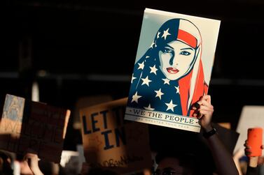 Shepard Fairey's famous image has been used to defend the status of Muslims in the United States. AP