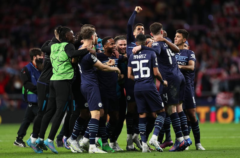 Manchester City players celebrate. Getty
