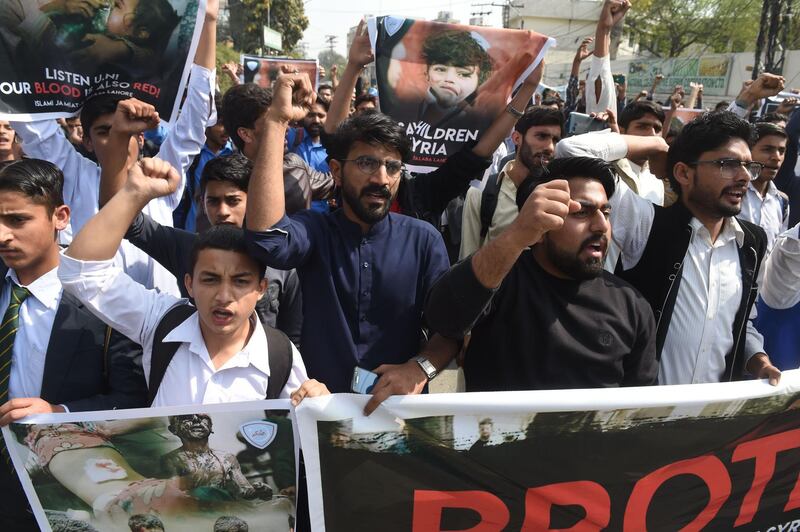 Pakistani supporters of the Jamaat-e-Islami (JI) organisation shout slogans against the ongoing conflict in Syria during a protest in Lahore on February 27, 2018.


The United Nations secretary-general on February 26 demanded the immediate implementation of 30-day ceasefire in Syria as the Damascus regime continued its deadly bombardment of the rebel-held Eastern Ghouta. / AFP PHOTO / ARIF ALI