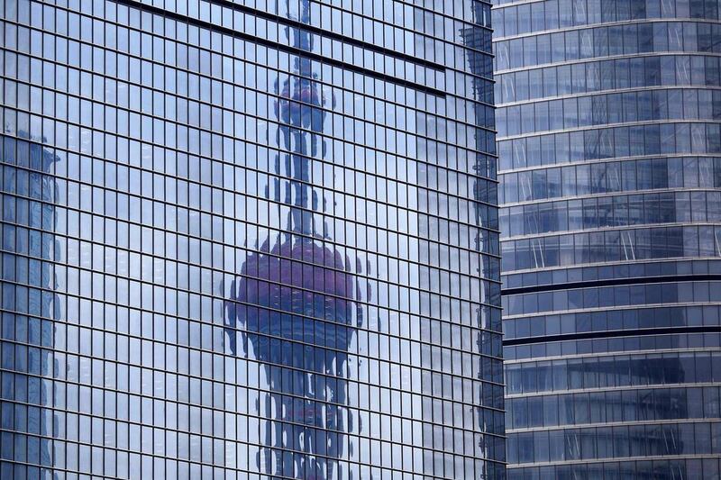 The Oriental Pearl TV Tower is reflected on the facade of another building at Pudong financial district in Shanghai. Carlos Barria/ Reuters