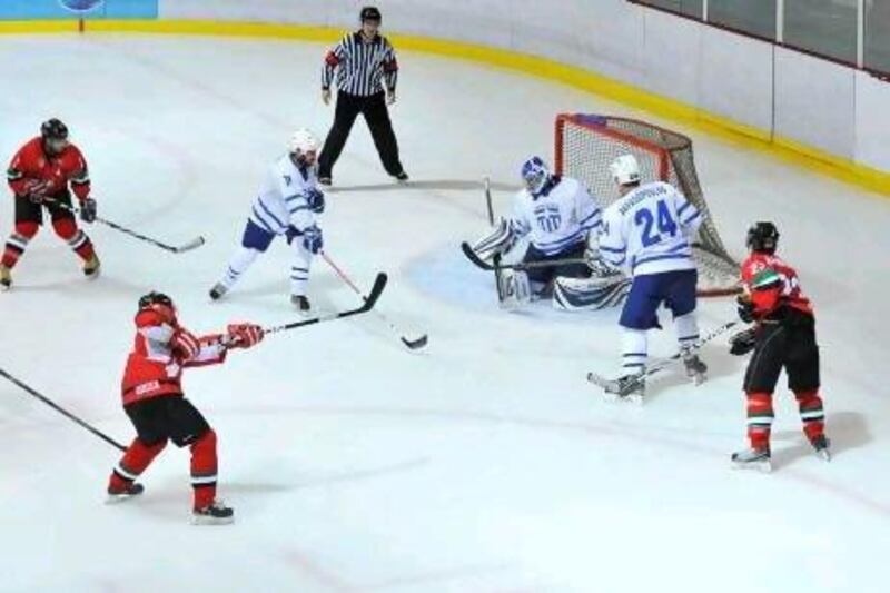 The UAE ice hockey team, in red, beat Greece 2-0 in their first match and Mongolia in the second. Charles Crowell for The National