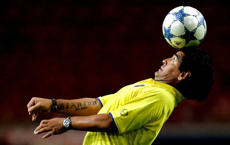 Argentinean soccer legend Diego Maradona shows his skills after the Ajax vs Boca Juniors soccer match during the Amsterdam four-team soccer tournament in the Arena stadium in Amsterdam on Sunday, 31 July 2005. EPA