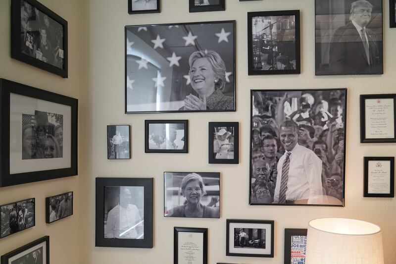 Photos of prominent politicians line the walls of Rachel Paine Caufield's office at Drake University in Des Moines, Iowa. All photos: Willy Lowry / The National