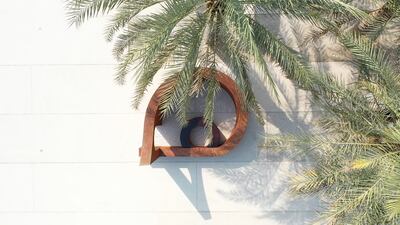 Azza Al Qubaisi’s installation 'Ha’a', renders the Arabic letter in stainless steel. Photo: Abu Dhabi Cultural Foundation