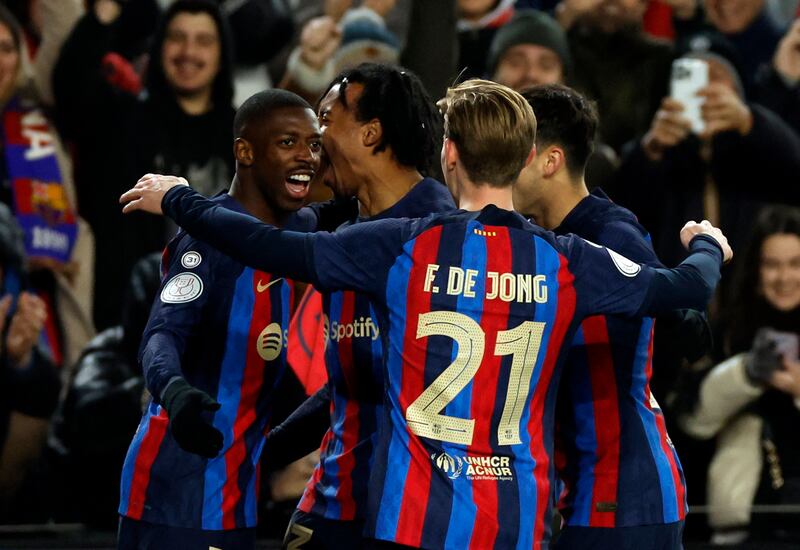 Barcelona's Ousmane Dembele (l) celebrates after scoring in the Copa del Rey quarter-final win against Real Sociedad at Camp Nou on January 25, 2023. Reuters