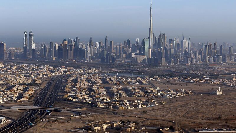 FILE PHOTO: Burj Khalifa, the world's tallest tower, is seen in a general view of Dubai, UAE December 9, 2015. Picture taken December 9, 2015. REUTERS/Karim Sahib/Pool/File Photo