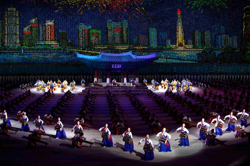 North Korean make artistic performance during an event for the national reunification marking the 11th anniversary of the publication of the Oct. 4 Declaration at the May Day Stadium in Pyongyang. AP