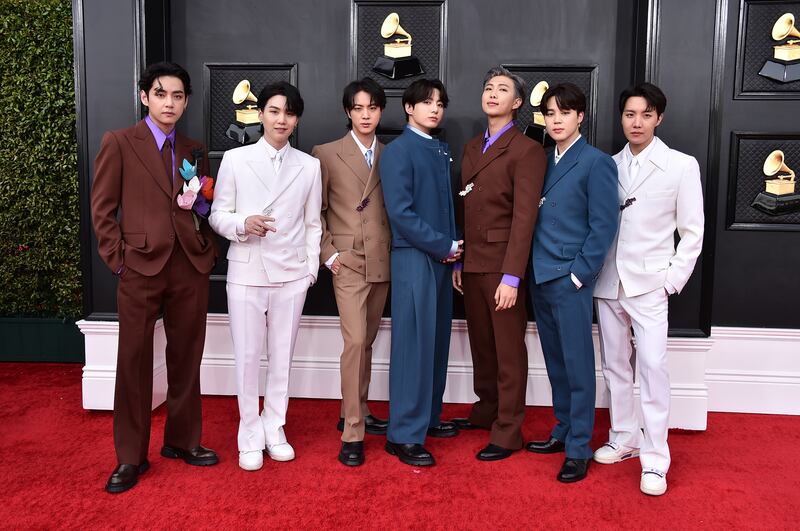 K-pop band BTS sported co-ordinated brown, white and blue looks, thanks to Louis Vuitton. AP