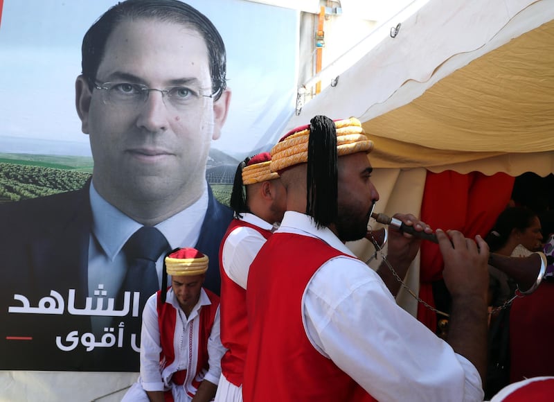 An election poster of Tunisia's Prime Minister Youssef Chahed, presidential candidate during a presidential electoral campaign in Sfax, Tunisia.  EPA