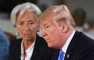 epa06796201 Managing Director of the International Monetary Fund Christine Lagarde (L) and US President Donald J. Trump (R) attend the G7 and Gender Equality Advisory Council Breakfast at the G7 summit in Charlevoix in Canada 09 June 2018. The G7 Summit runs from 08 to 09 June in Charlevoix, Canada.  EPA/NEIL HALL / POOL