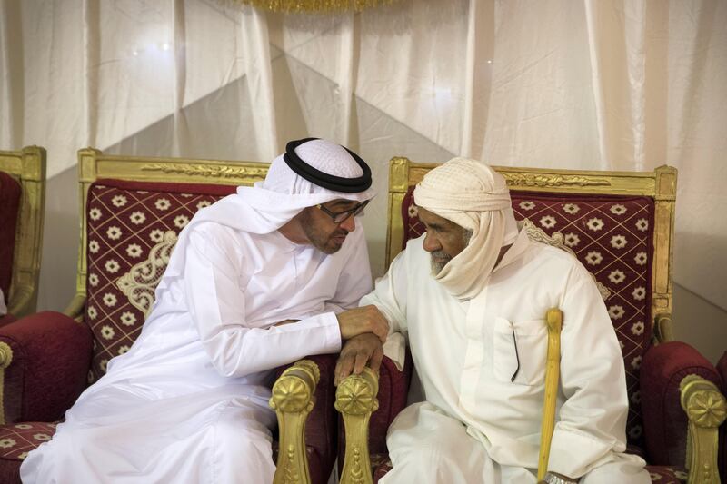 FUJAIRAH, UNITED ARAB EMIRATES - August 13, 2017: HH Sheikh Mohamed bin Zayed Al Nahyan, Crown Prince of Abu Dhabi and Deputy Supreme Commander of the UAE Armed Forces (L), offers condolences to the Rashed Al Hassani (R), the father of the martyr Mohamed Rashed Al Hassani, who passed away while serving with the UAE Armed Forces in Yemen.

( Mohamed Al Hammadi / Crown Prince Court - Abu Dhabi )
---