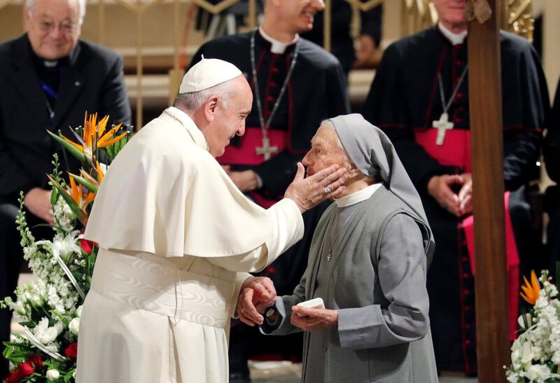 Pope Francis greets a nun at Saint Peter's Cathedral in Rabat, Morocco. REUTERS