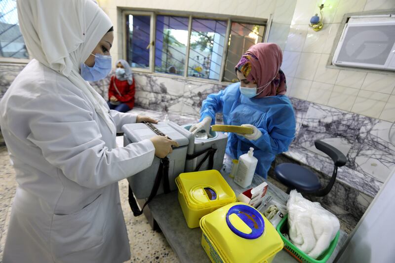 In Iraq, more than 60 per cent of healthcare workers have been partially vaccinated though only about 40 per cent have been fully vaccinated. EPA