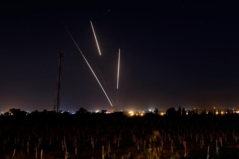 Streaks of light are pictured as rockets are launched from the Gaza Strip towards Israel. Reuters