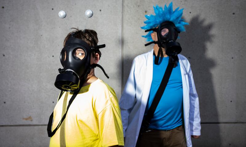 Gavin, 13, left, and his dad Joe, of New York, cosplay as Rick and Morty at New York Comic Con. Justin Lane / EPA