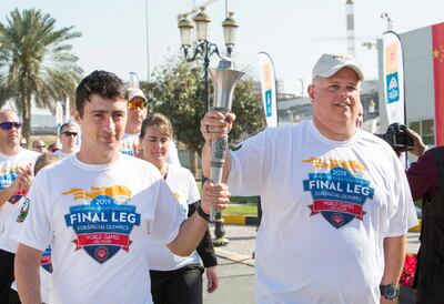 DUBAI, UNITED ARAB EMIRATES - Arrival of the torch at the Special Olympics Torch Run at Al Thiqah Club for Handicapped.  Leslie Pableo for The National