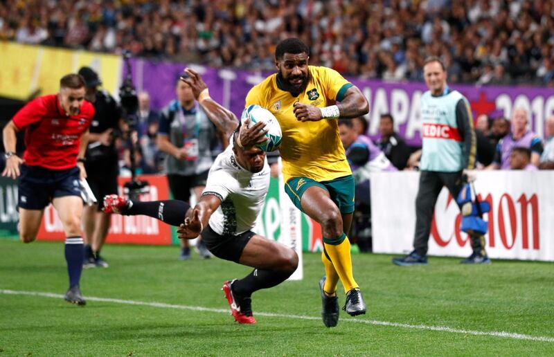 Rugby Union - Rugby World Cup 2019 - Pool D - Australia v Fiji - Sapporo Dome, Sapporo, Japan - September 21, 2019 Australia's Marika Koroibete scores their sixth try REUTERS/Edgar Su