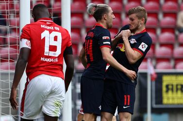 Soccer Football - Bundesliga - 1. FSV Mainz 05 v RB Leipzig - Opel Arena, Mainz, Germany - May 24, 2020 RB Leipzig's Timo Werner celebrates scoring their fourth goal with Kevin Kampl, as play resumes behind closed doors following the outbreak of the coronavirus disease (COVID-19) REUTERS/Kai Pfaffenbach/Pool DFL regulations prohibit any use of photographs as image sequences and/or quasi-video