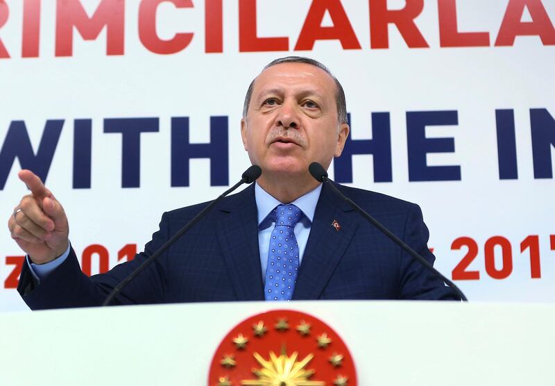 Turkey's president Recep Tayyip Erdogan, addressing foreign investor representatives in Ankara on July 12, 2017, bristles at accusations he is muzzling the press, saying authorities are simply rooting out criminals. 'If the media abuses all kinds of freedoms to cause turmoil in the country or to cause provocations, then there is the judiciary for them too,' he said. Kayhan Ozer/Presidency Press Service via AP