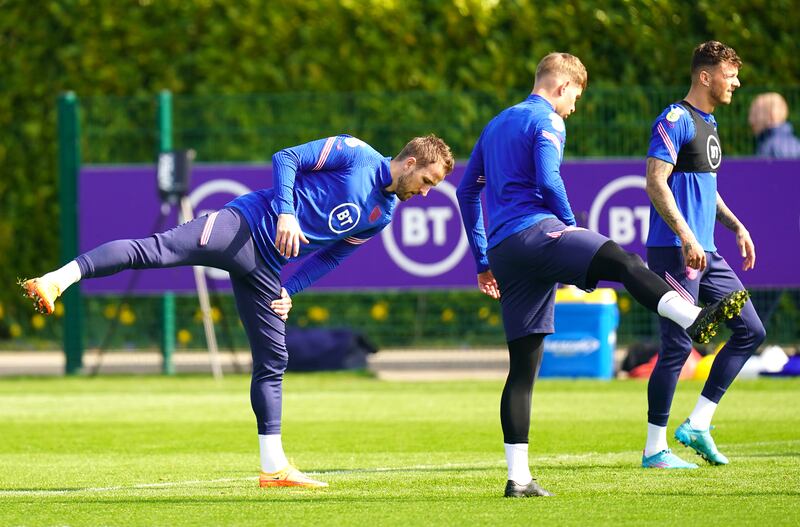England's Harry Kane warming-up with teammates. PA