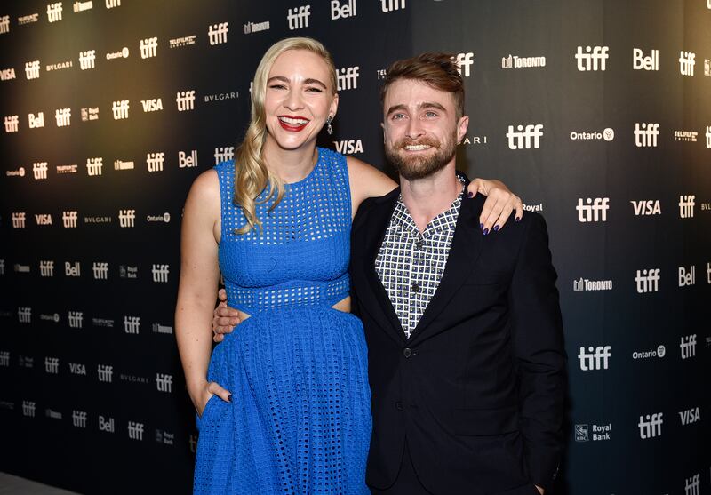 Daniel Radcliffe, right, and girlfriend Erin Darke attend the premiere for 'Weird: The Al Yankovic Story' at the Royal Alexandra Theatre. Invision / AP