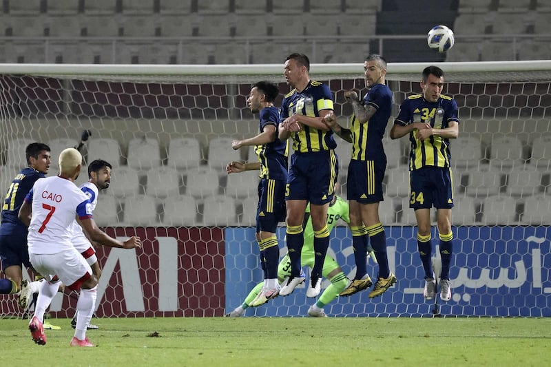 Sharjah's midfielder Caio attempts a free-kick. AFP
