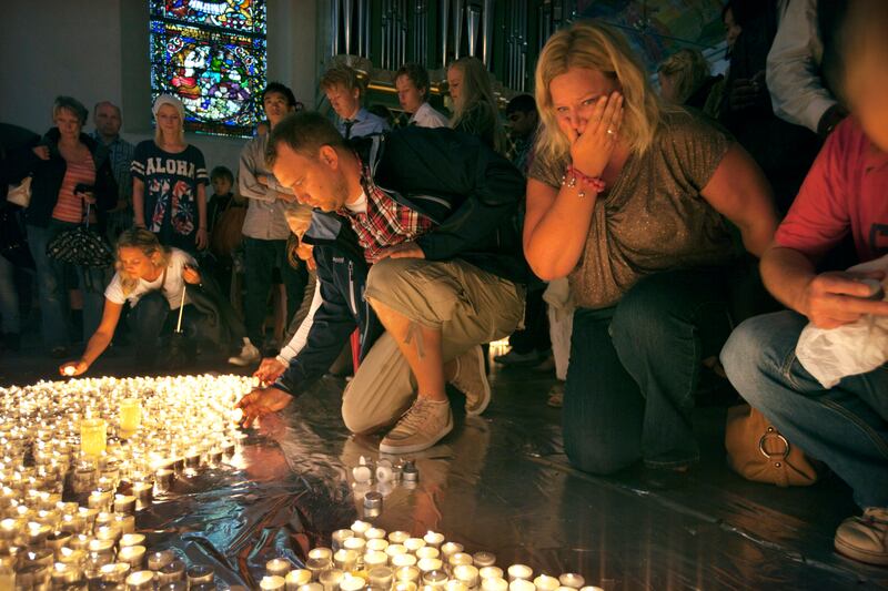 Mourners in 2011 at Oslo Cathedral.