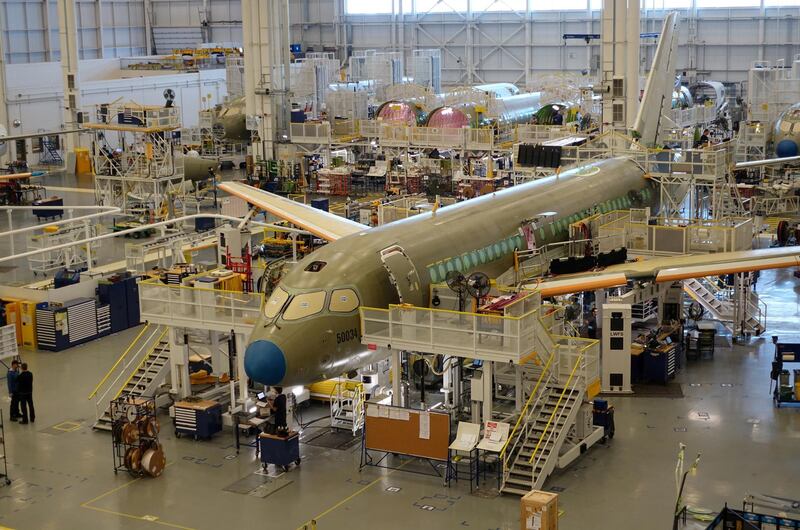 FILE PHOTO: An Airbus A220 passenger jet, formerly known as the Bombardier CSeries, stands in the final assembly line where the European company plans a $30 million investment to keep up with forecast demand, in Mirabel near Montreal, Quebec, Canada January 14, 2019. Airbus acquired the former Bombardier jet in 2018. REUTERS/Tim Hepher/File Photo