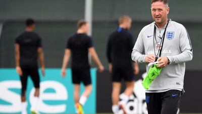 England's assistant coach Steve Holland attends a training session at Spartak Zelenogorsk Stadium in Saint Petersburg. Holland apologised to the squad after images were released of him holding what appeared to show England's team to face Panama. Paul Ellis / AFP