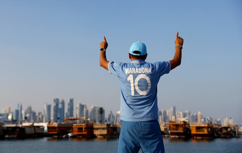 An Argentina fan in Doha Corniche wearing a No.10 Diego Maradona shirt. Reuters