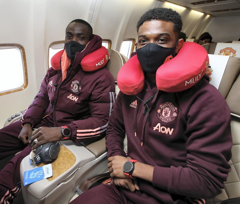 MANCHESTER, ENGLAND - FEBRUARY 17: (EXCLUSIVE COVERAGE)  Eric Bailly of Manchester United poses on the plane ahead of their flight to Turin at Manchester Airport on February 17, 2021 in Manchester, England. (Photo by Matthew Peters/Manchester United via Getty Images)