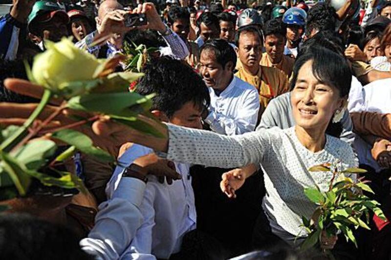 Crowds chanted ‘Long Live Aung San Suu Kyi’ in Yangon yesterday after Myanmar’s pro-democracy leader announced she will run in by-elections.