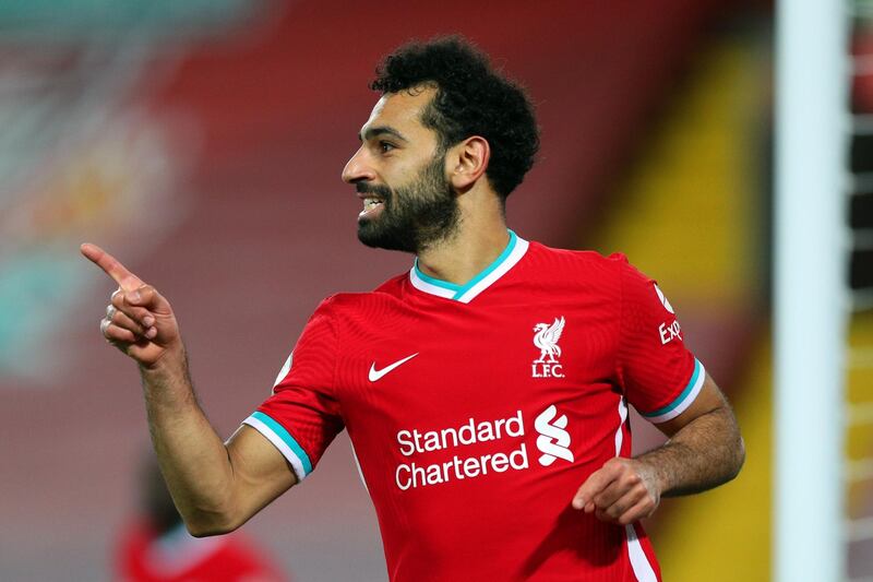 LIVERPOOL, ENGLAND - OCTOBER 24: Mohamed Salah of Liverpool celebrates after scoring a goal which is then disallowed following a VAR review during the Premier League match between Liverpool and Sheffield United at Anfield on October 24, 2020 in Liverpool, England. Sporting stadiums around the UK remain under strict restrictions due to the Coronavirus Pandemic as Government social distancing laws prohibit fans inside venues resulting in games being played behind closed doors. (Photo by Peter Byrne - Pool/Getty Images)