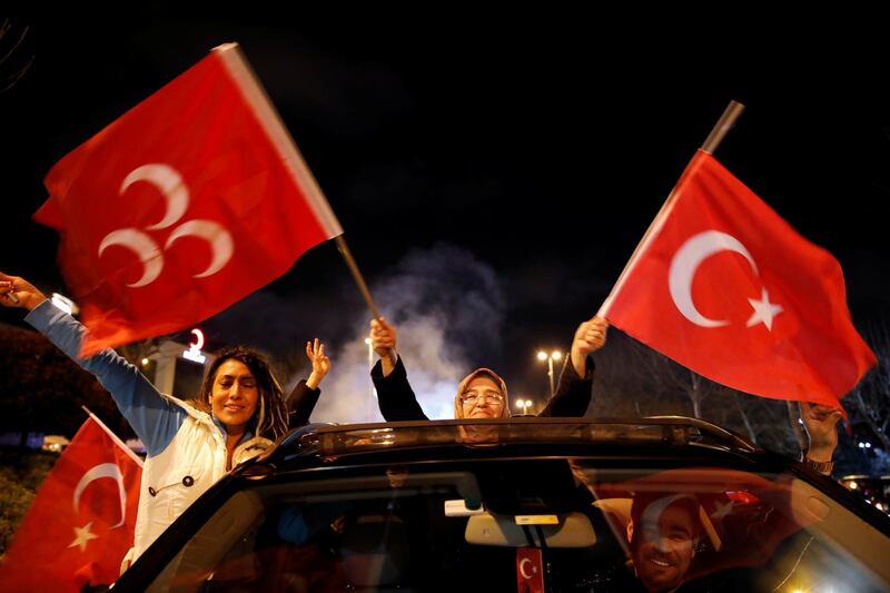 Supporters of the AKP wave flags in Istanbul. Reuters
