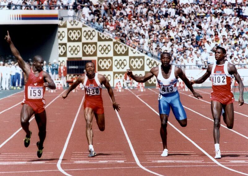 Johnson's contest was not with Mitchell, though, but his compatriot Carl Lewis, far right. The 26 year old won, edging Lewis and creating a new world record of 9.79 seconds in the process. The British Linford Christie, second right, finished third while Calvin Smith, second left, of the United States, placed fourth. AFP