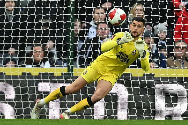 FA CUP TEAM OF THE WEEK: Goalkeeper: Dimitar Mitov (Cambridge) – Made a series of spectacular saves, with the best to deny Joelinton and Jacob Murphy, to keep a clean sheet against Newcastle at St James’ Park. AFP