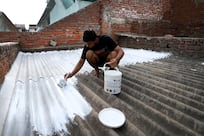 Reflective paint initiative helps to keep homes cool in India 