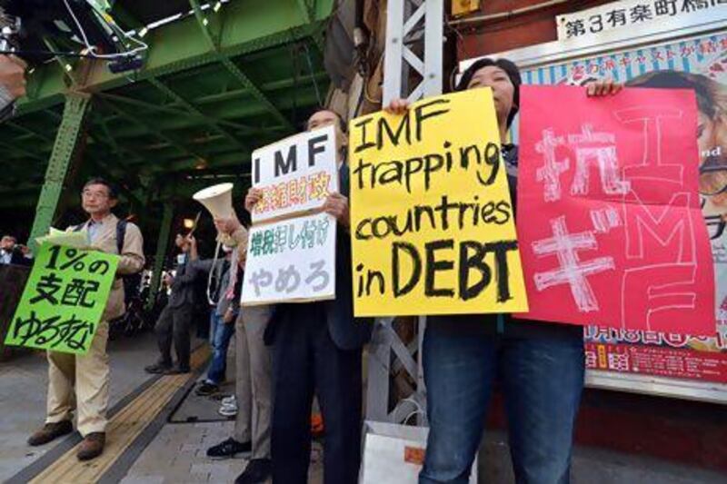 Anti-globalisation activists stage a protest outside of the annual meetings of the World Bank and International Monetary Fund in Tokyo. Yoshikazu Tsuno / AFP