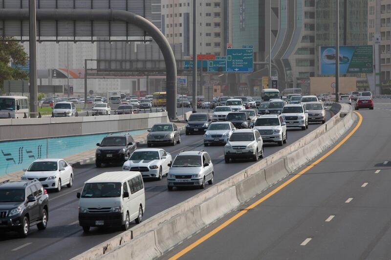 Dubai, United Arab Emirates - August 21, 2013.  E 11 or Al Ittihad Road one of the major thoroughfares connecting Dubai and Northern Emirates is seen as traffic is slowly building up heading towards Dubai, while on the other side heading towards Sharjah traffic was light and smooth.  ( Jeffrey E Biteng / The National )  Editor's Note;  No reporter's name available on the list. *** Local Caption ***  JB210813-Traffic03.jpg
