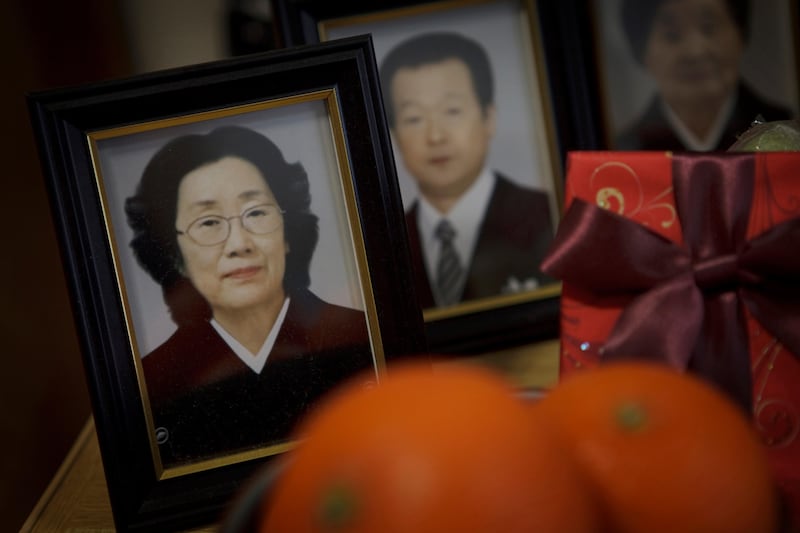 Photo of Hisako Takahashi, left, is placed at family shrine at temporary house of her husband, Yoshihiro Takahashi, 65, in Onagawa in Miyagi prefecture, Japan on Feb 28, 2012. Hisako was killed among her mother-in-law his wife, Satoko, by the massive tsunami hit the northern Japan on March 11, 2011.
Photo by Kuni Takahashi