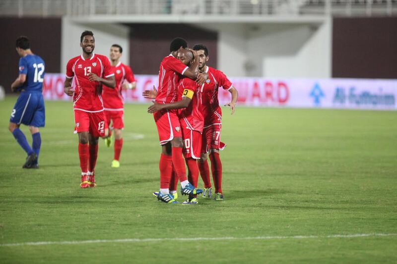 Ismail Matar, second from right, scored one of UAE's four goals against the Philippines. Lee Hoagland / The National